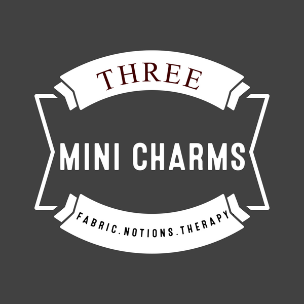Three Mini Charms logo